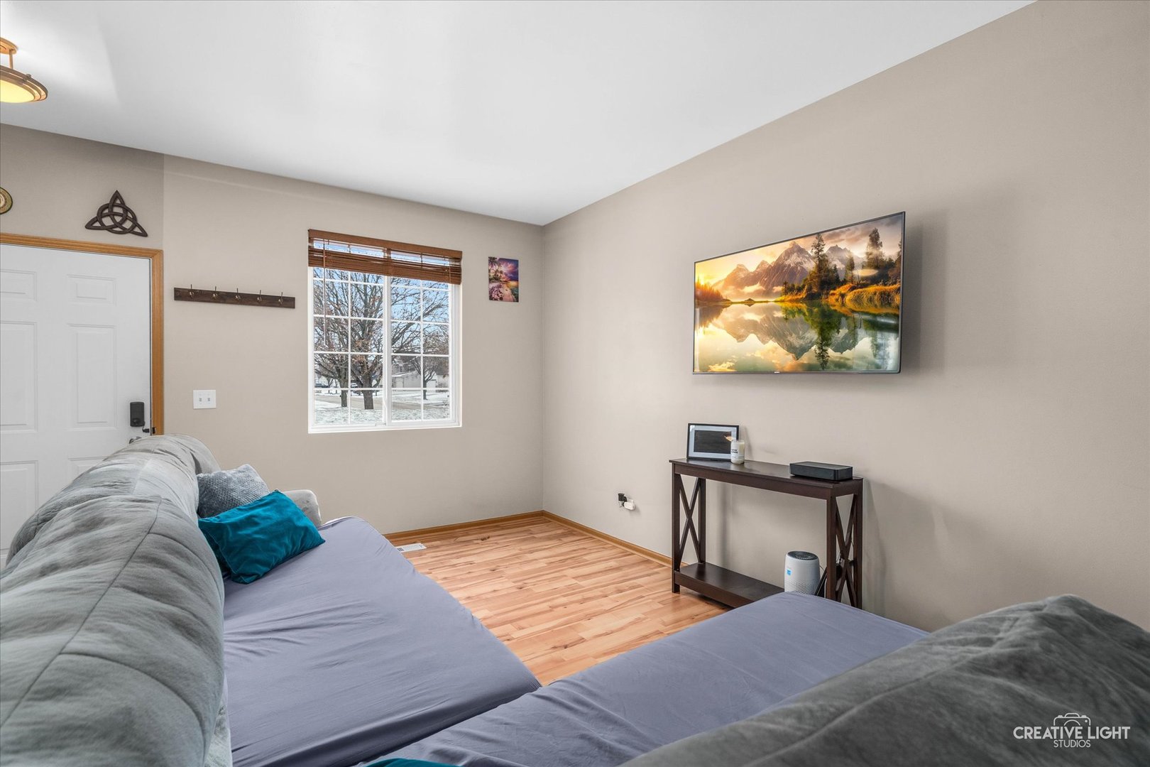 1517 Azalea Circle Romeoville, IL 60446 - Photo 3 of 19 a bedroom with a bed and a painting on the wall