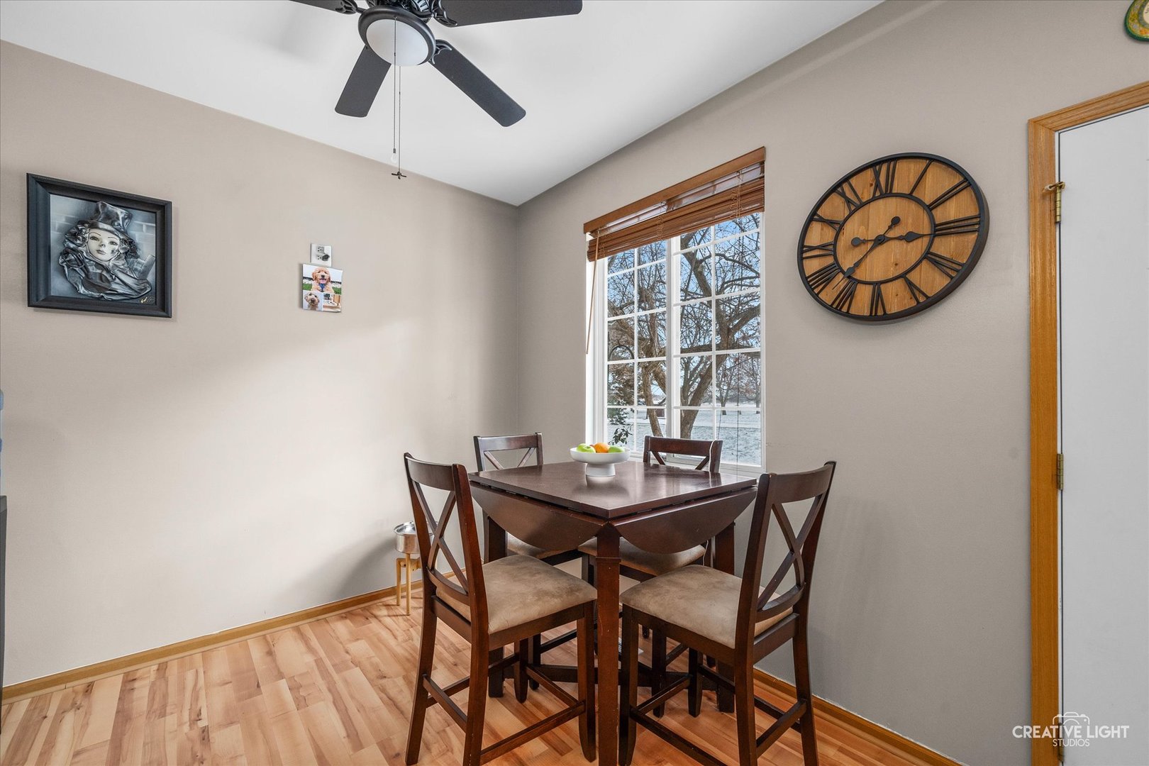 1517 Azalea Circle Romeoville, IL 60446 - Photo 5 of 19 a view of a dining room with furniture and a window