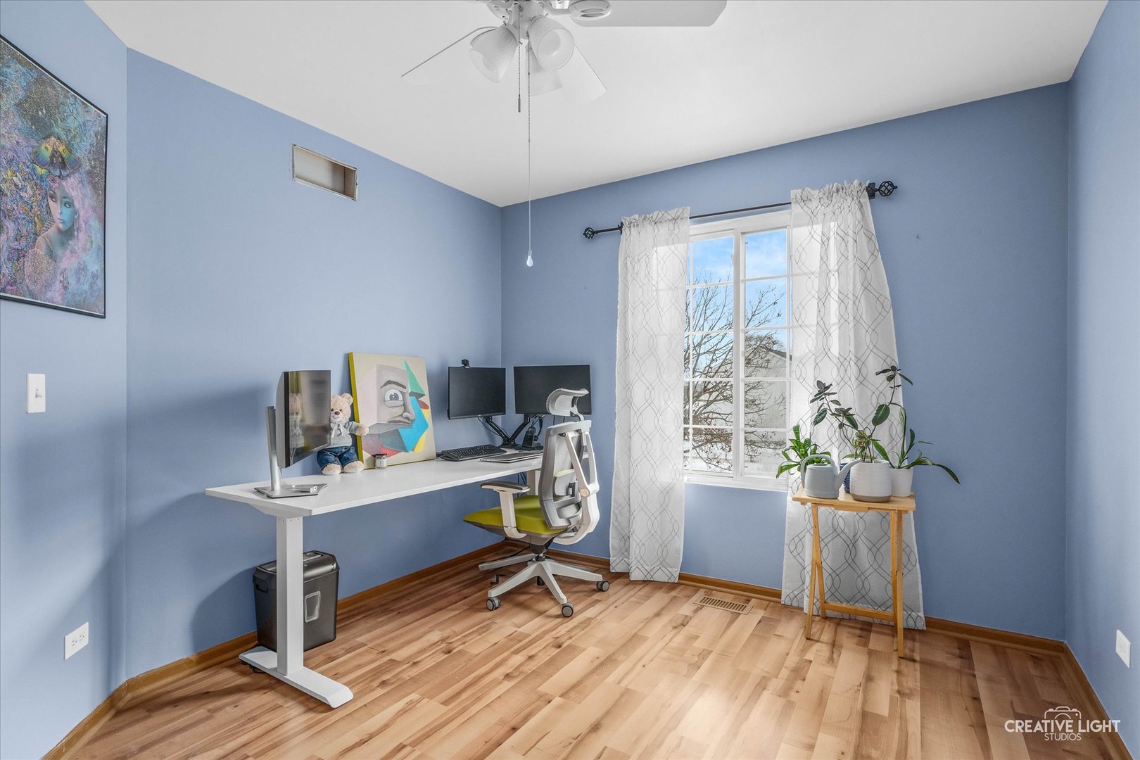 1517 Azalea Circle Romeoville, IL 60446 - Photo 10 of 19 a view of a workspace with furniture and a window