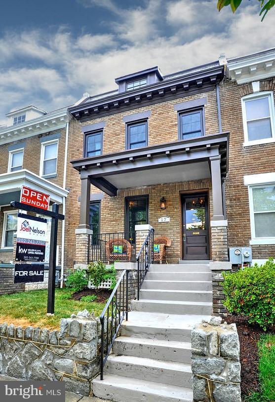 a view of a building and a entrance gate