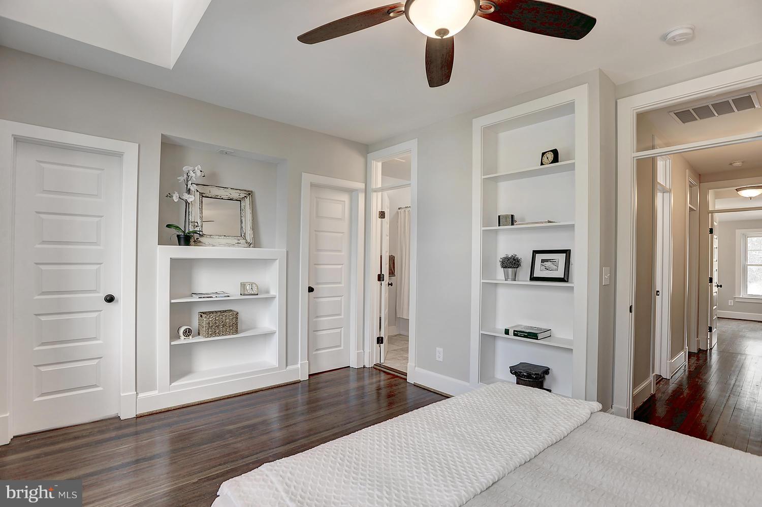 17 16th Street Southeast Washington, DC 20003 - Photo 16 of 29 a bedroom with a bed and wooden floor