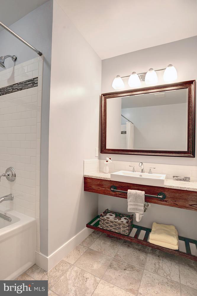 17 16th Street Southeast Washington, DC 20003 - Photo 17 of 29 a bathroom with a sink and a mirror