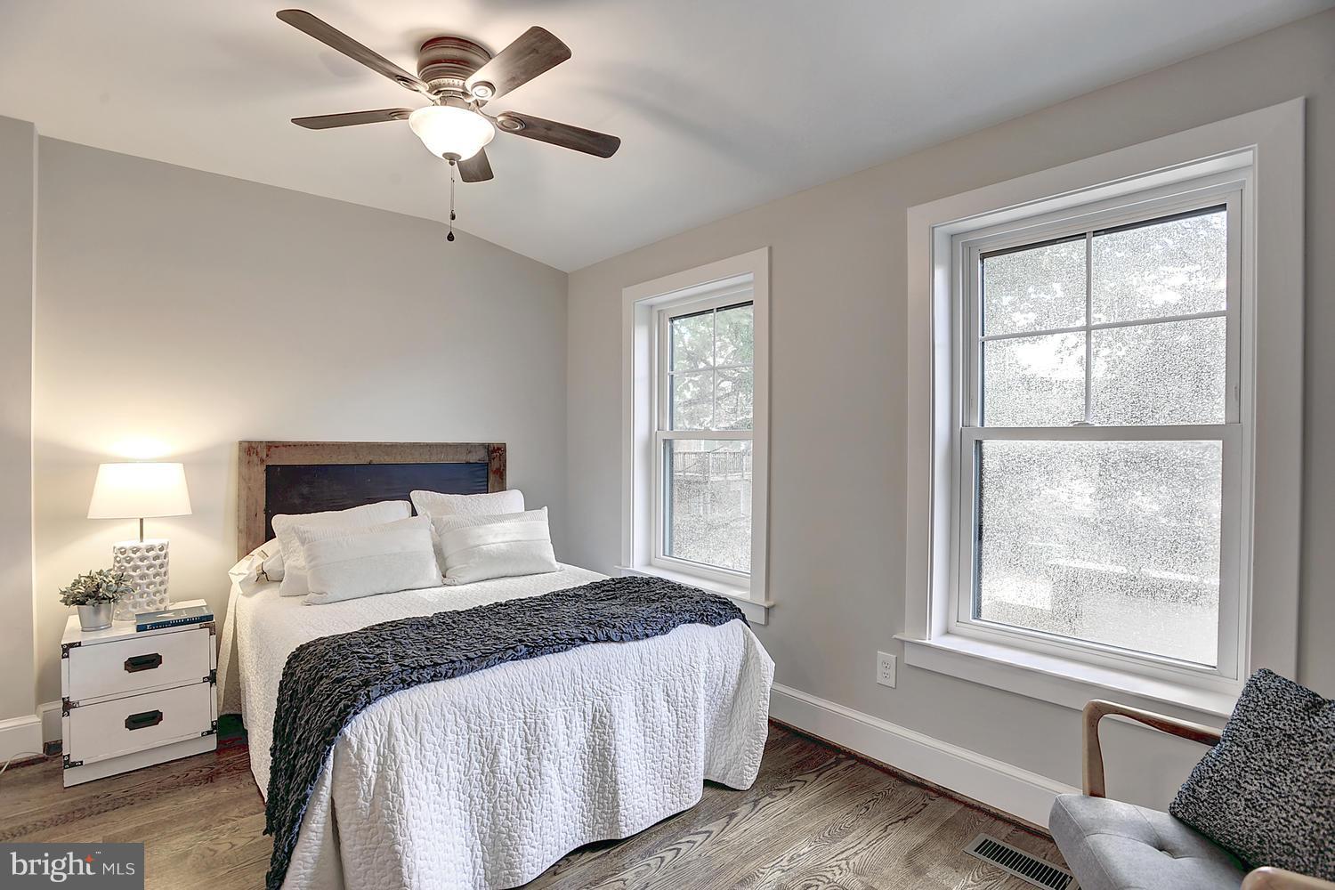 17 16th Street Southeast Washington, DC 20003 - Photo 18 of 29 a bedroom with a large bed and a window