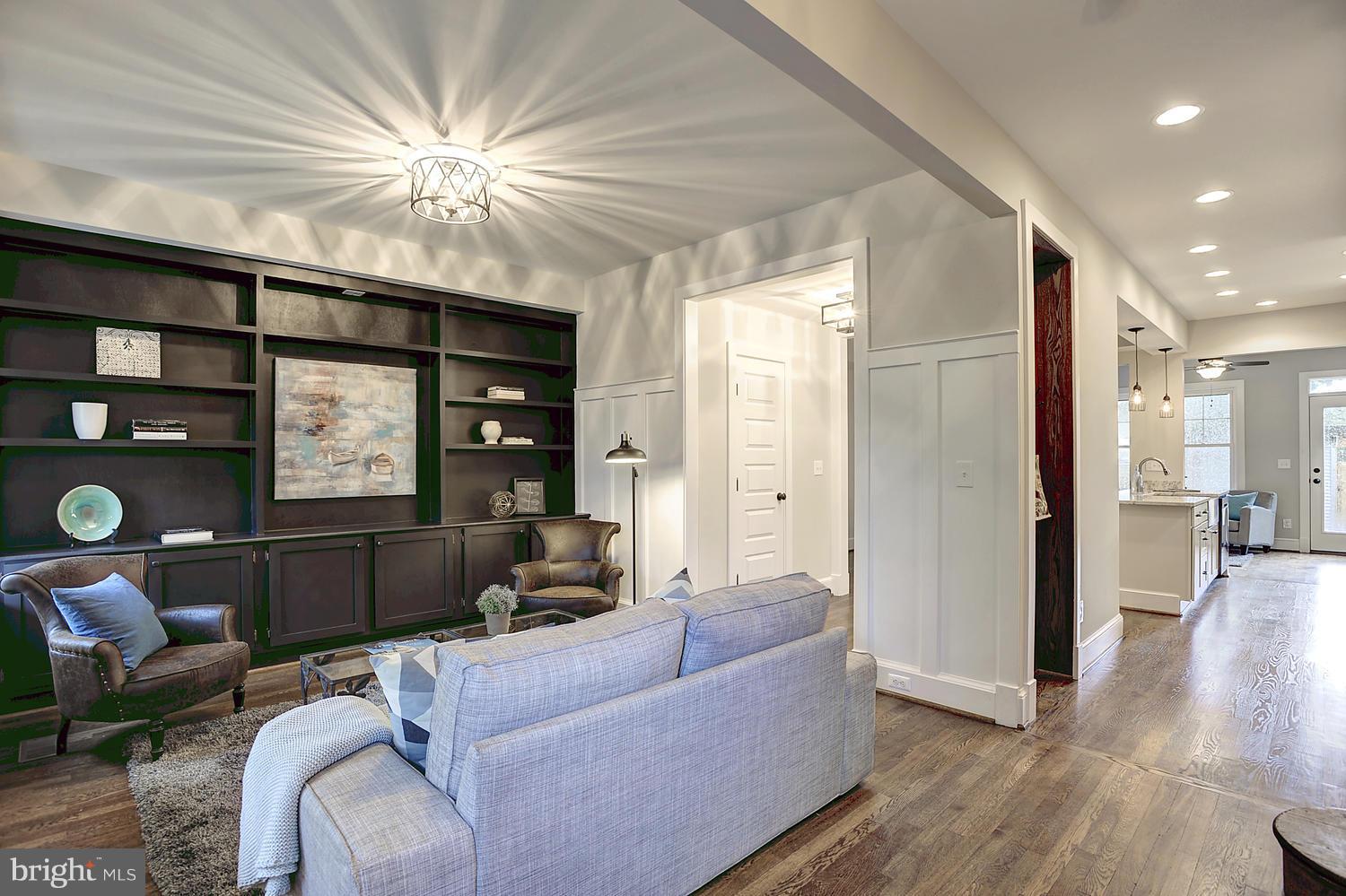 17 16th Street Southeast Washington, DC 20003 - Photo 3 of 29 a living room with furniture and a large window