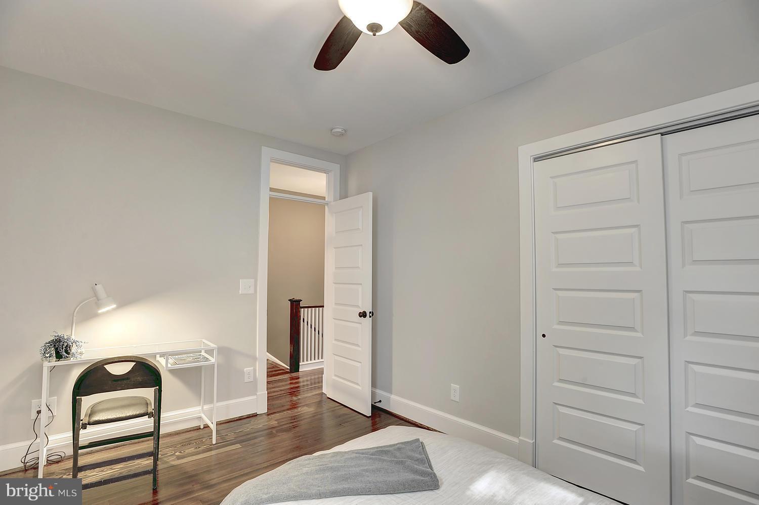 17 16th Street Southeast Washington, DC 20003 - Photo 21 of 29 wooden floor in an empty room