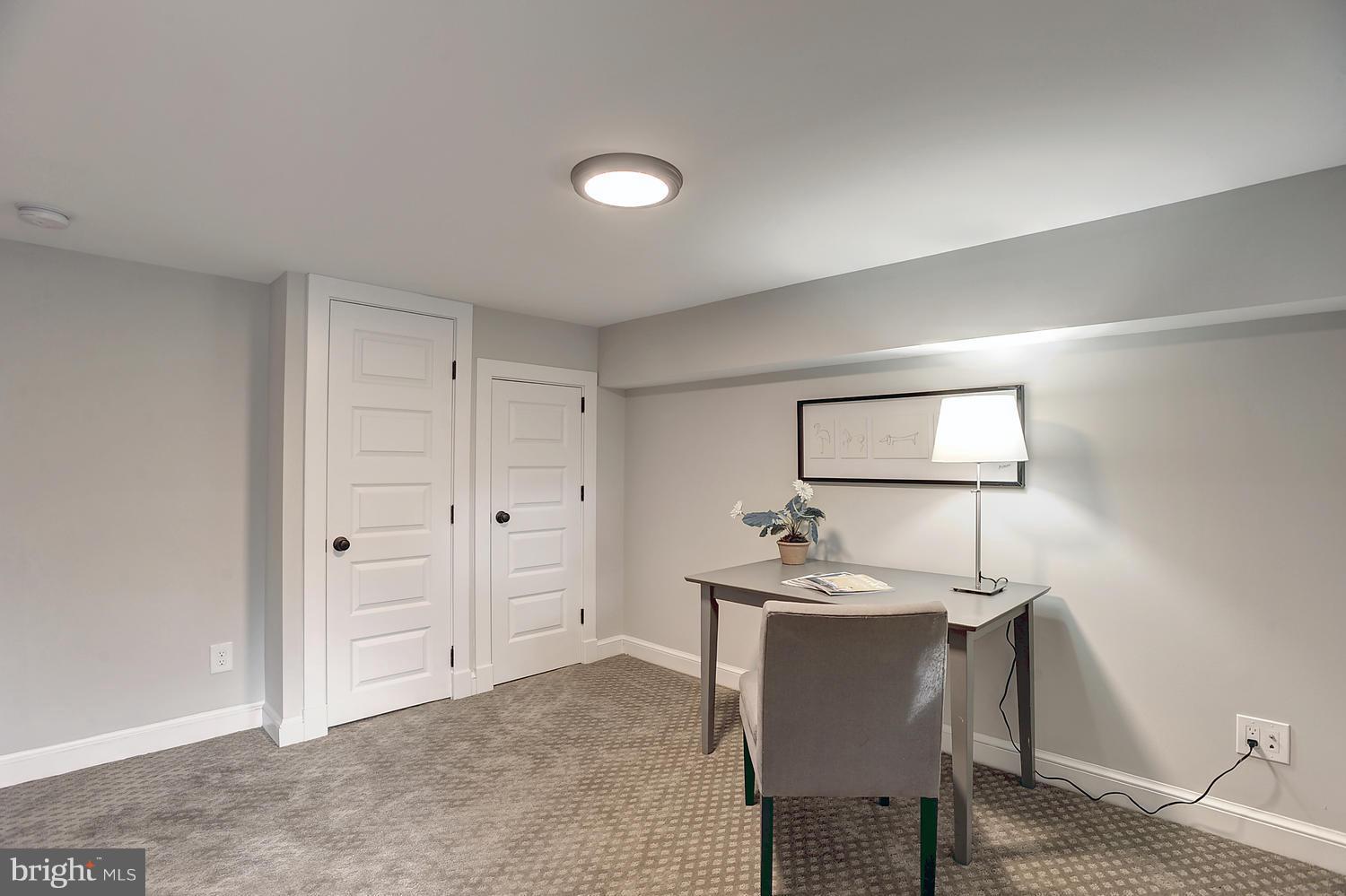 17 16th Street Southeast Washington, DC 20003 - Photo 26 of 29 a workspace with furniture and window