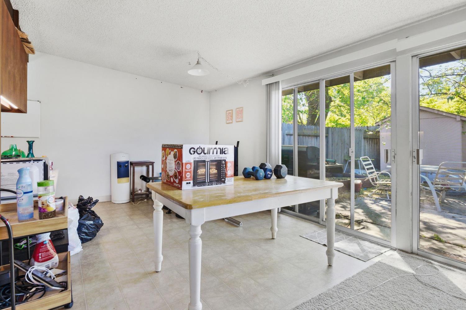 916 Drake Drive Davis, CA 95616 - Photo 11 of 19 a view of a workspace with furniture and a window