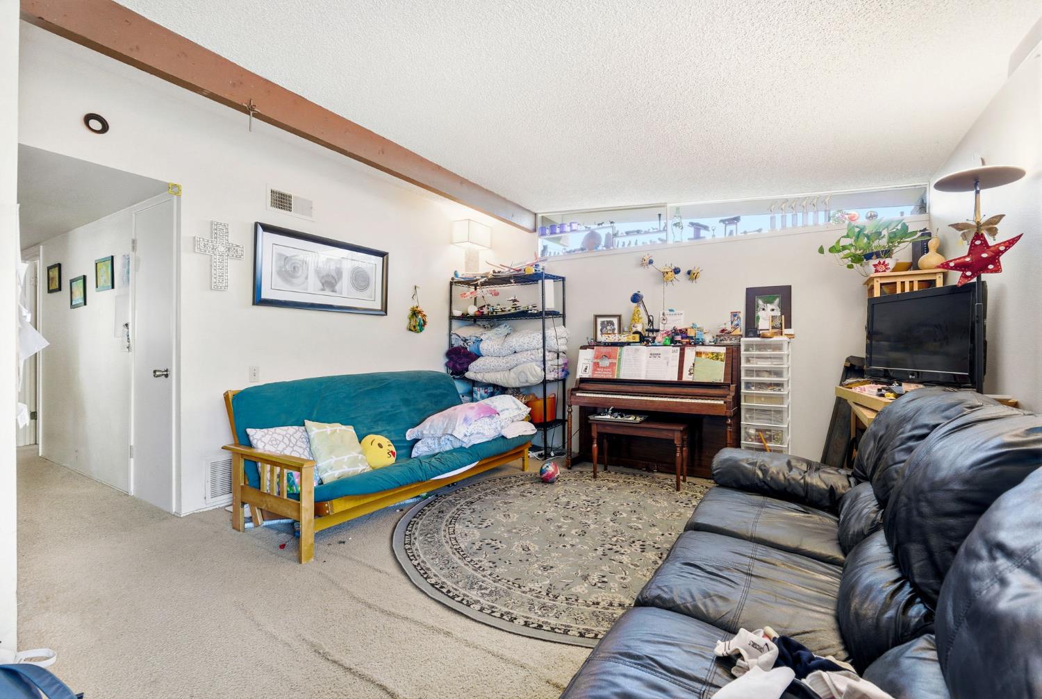 916 Drake Drive Davis, CA 95616 - Photo 4 of 19 a living room with furniture and a couch