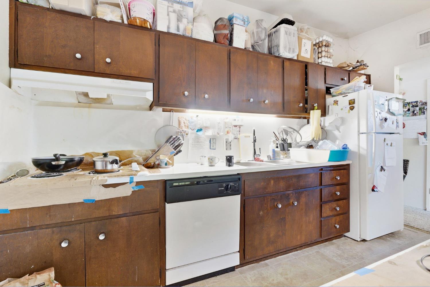 916 Drake Drive Davis, CA 95616 - Photo 6 of 19 a kitchen with a sink and cabinets