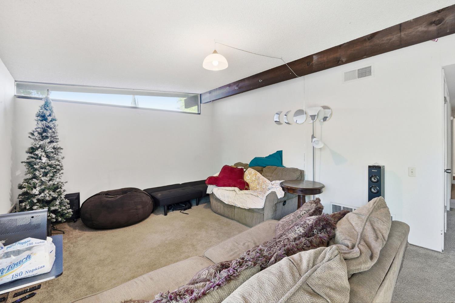 916 Drake Drive Davis, CA 95616 - Photo 10 of 19 a bedroom with a bed and a potted plant