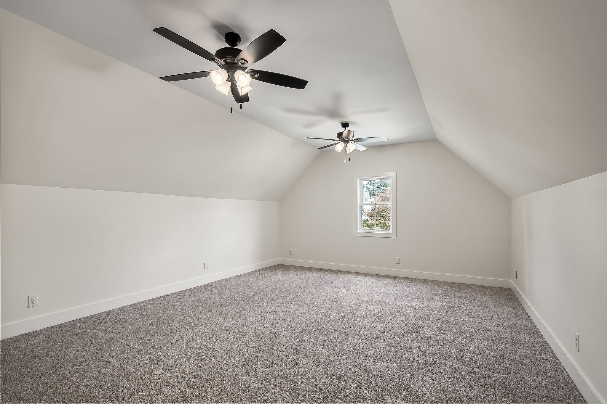 146 Simons Boulevard Morrison, TN 37357 - Photo 23 of 28 an empty room with chandelier fan and windows