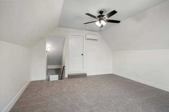 a view of a room with wooden floor and balcony