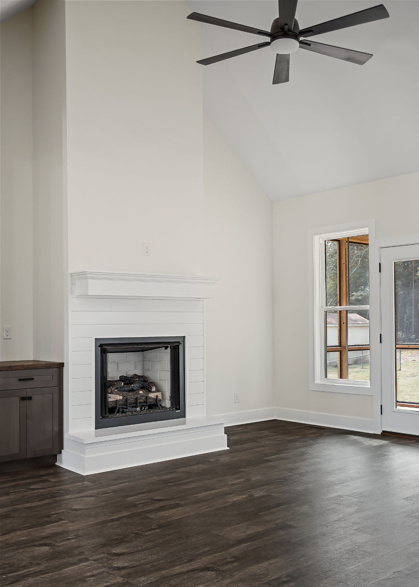 146 Simons Boulevard Morrison, TN 37357 - Photo 8 of 28 a living room with a fireplace with wooden floor