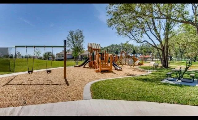 a view of a park with swings