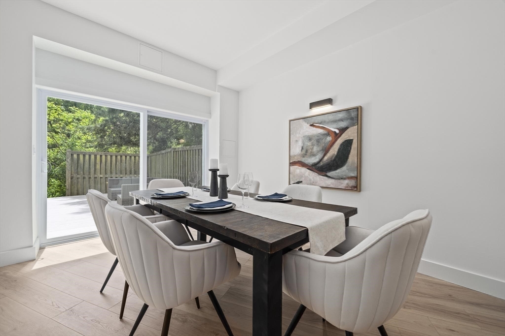 44 Ober Road, Unit 44 Newton, MA 02459 - Photo 6 of 41 a view of a dining room with furniture window and outside view