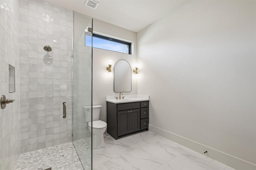 1405 Chelsea Rae Lane Keller, TX 76262 - Photo 18 of 35 a bathroom with a sink a toilet and shower