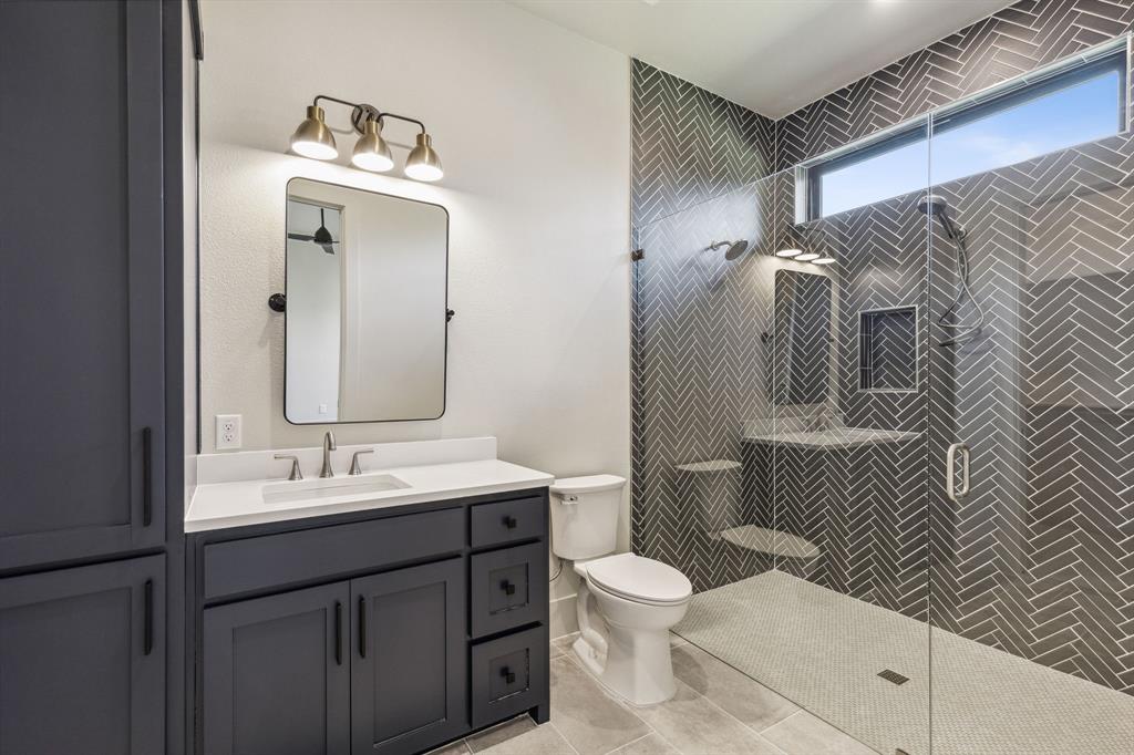 1405 Chelsea Rae Lane Keller, TX 76262 - Photo 20 of 35 a bathroom with a sink a toilet and shower
