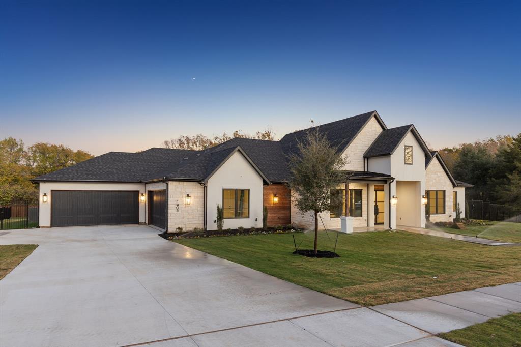 1405 Chelsea Rae Lane Keller, TX 76262 - Photo 2 of 35 a front view of a house with a yard and trees