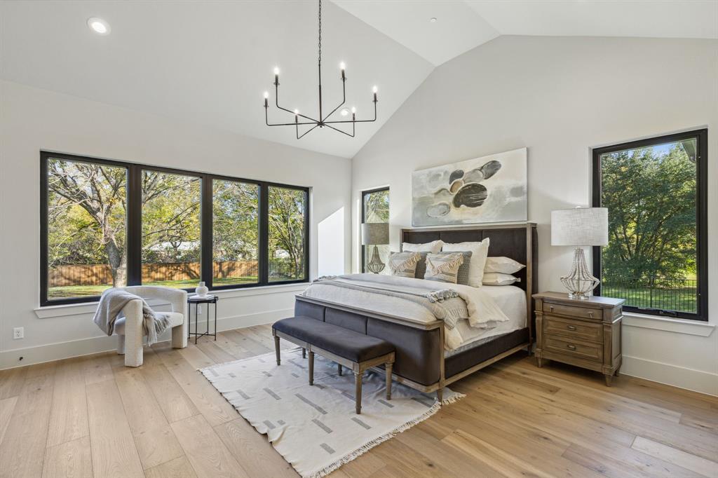 1405 Chelsea Rae Lane Keller, TX 76262 - Photo 22 of 35 a spacious bedroom with a bed and a large window