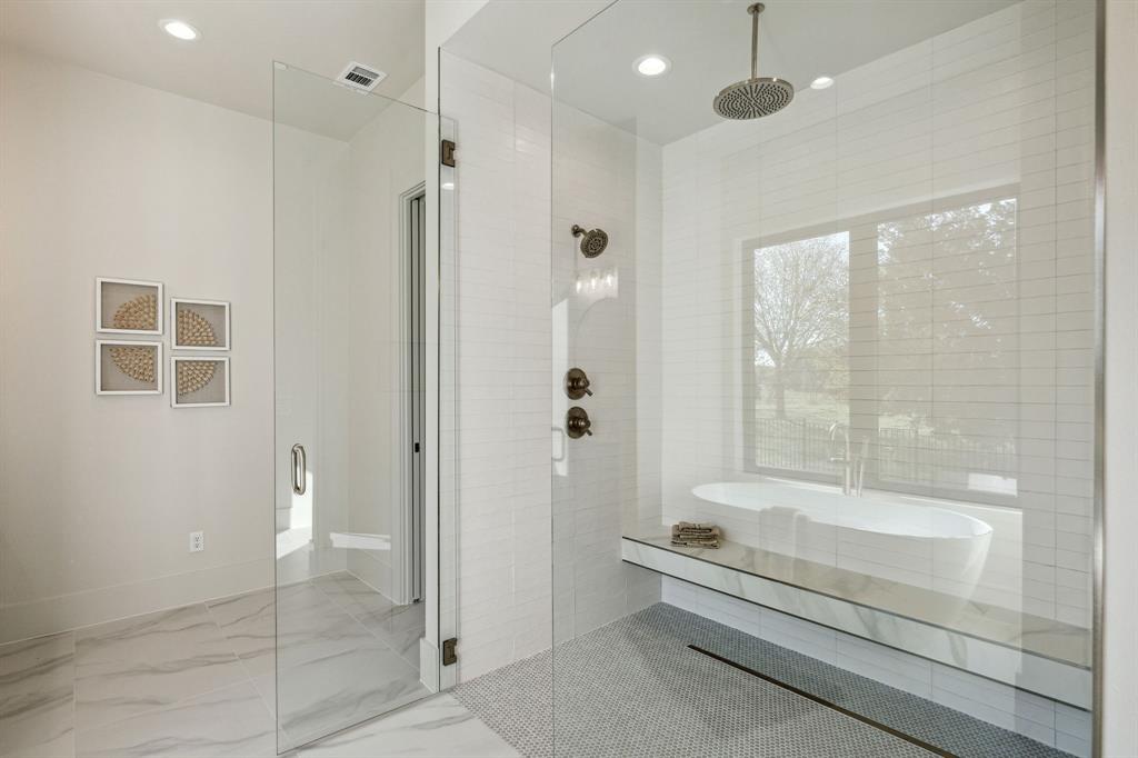 1405 Chelsea Rae Lane Keller, TX 76262 - Photo 25 of 35 a bathroom with a bathtub and a shower