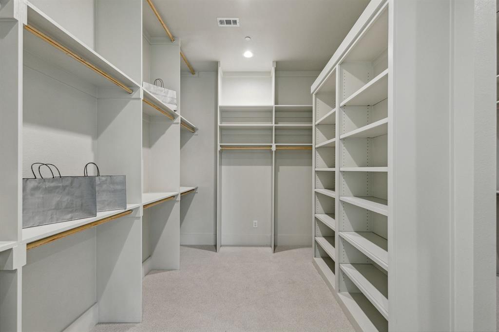 1405 Chelsea Rae Lane Keller, TX 76262 - Photo 26 of 35 a view of walk in closet with empty racks