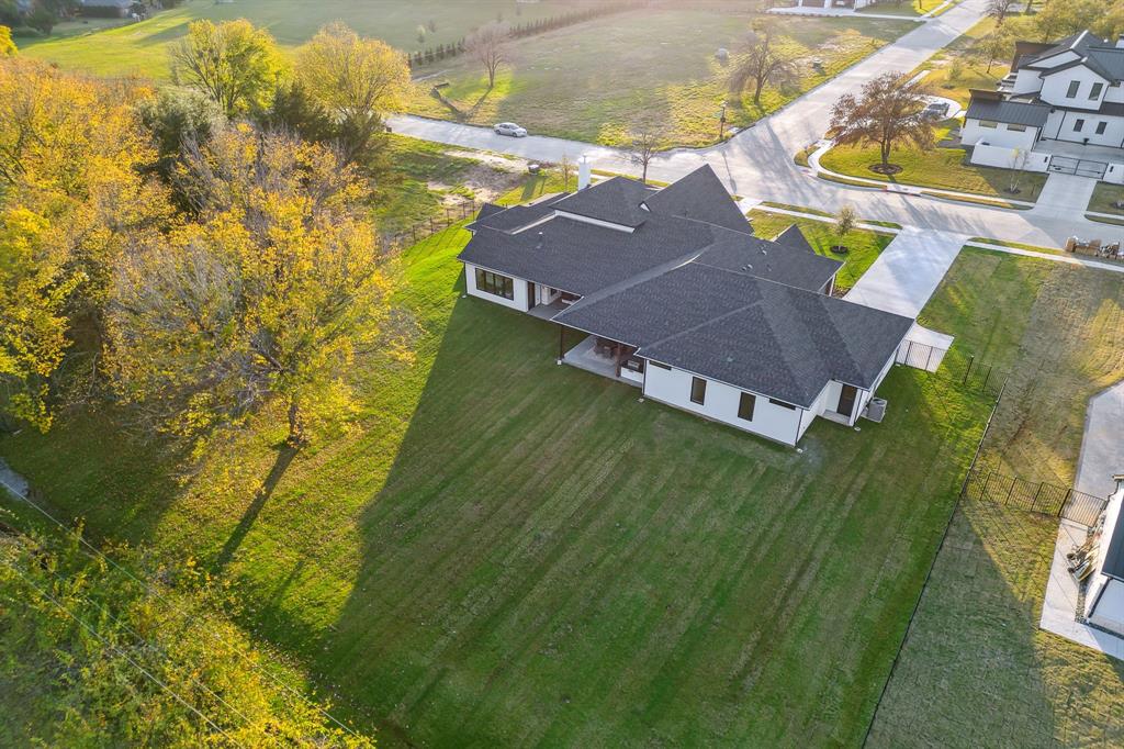 1405 Chelsea Rae Lane Keller, TX 76262 - Photo 32 of 35 a view of an house with a yard