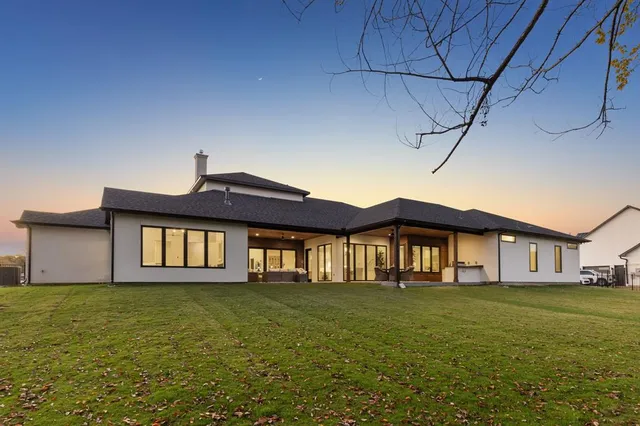 a view of a patio with chairs
