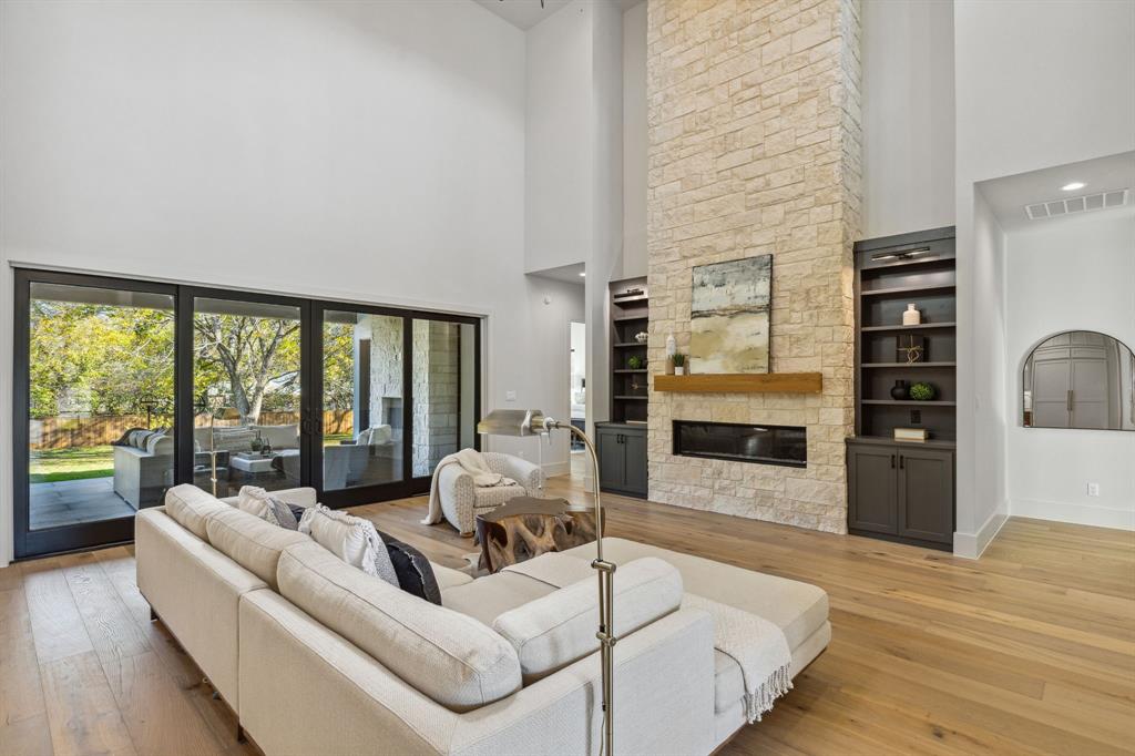 1405 Chelsea Rae Lane Keller, TX 76262 - Photo 7 of 35 a living room with furniture and a flat screen tv