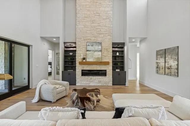 a living room with furniture and flat screen tv