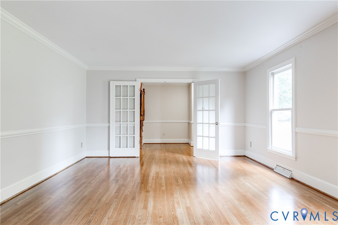 3924 Belspring Road Chester, VA 23831 - Photo 10 of 36 Spacious room featuring hardwood flooring, white c