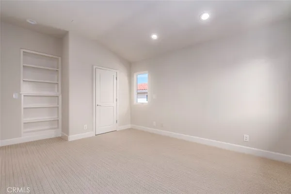 a view of a house with backyard porch and sitting area