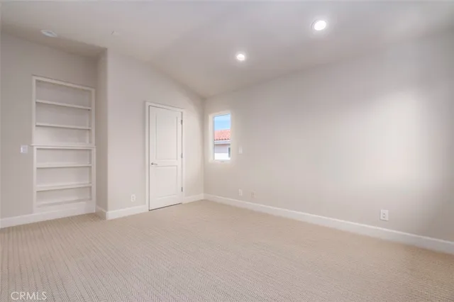 a view of a house with backyard porch and sitting area