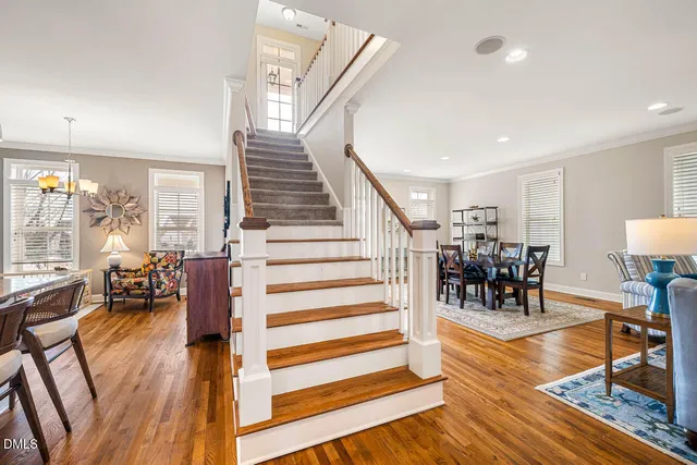 a view of a house with floor to ceiling windows