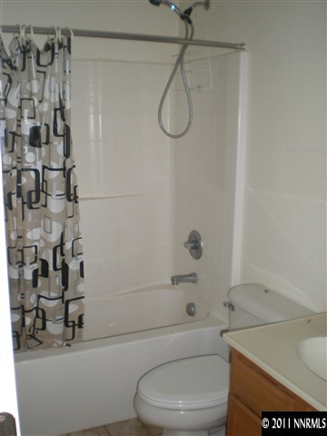 480 Stradella Court Reno, NV 89521 - Photo 6 of 13 a bathroom with a toilet and a shower