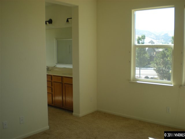 480 Stradella Court Reno, NV 89521 - Photo 9 of 13 a view of an empty room with a window