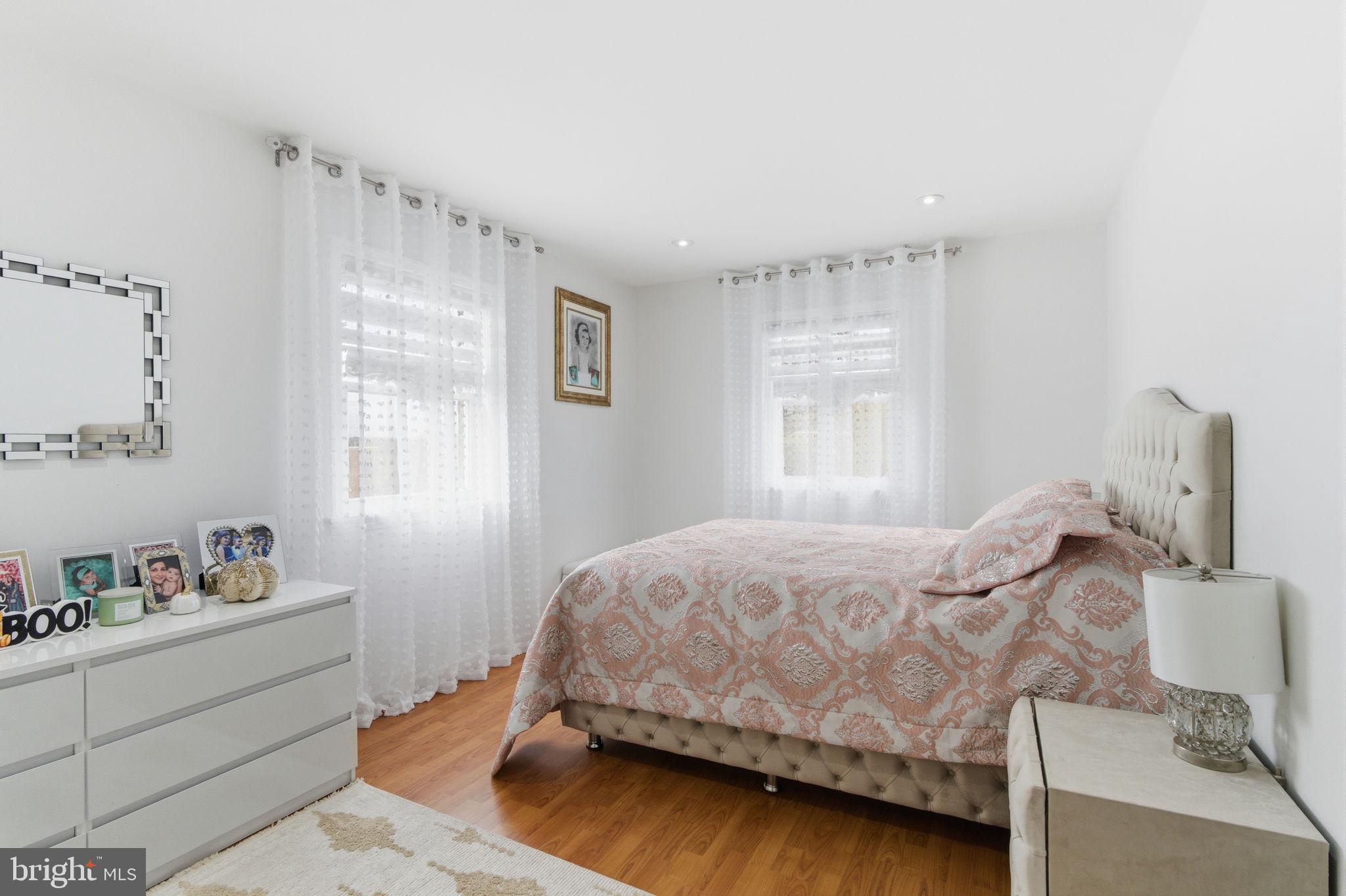 148 Rennard Street Philadelphia, PA 19116 - Photo 15 of 31 a bedroom with a bed and window
