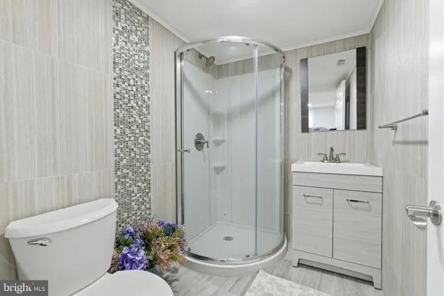 a view of a chairs and table in the balcony