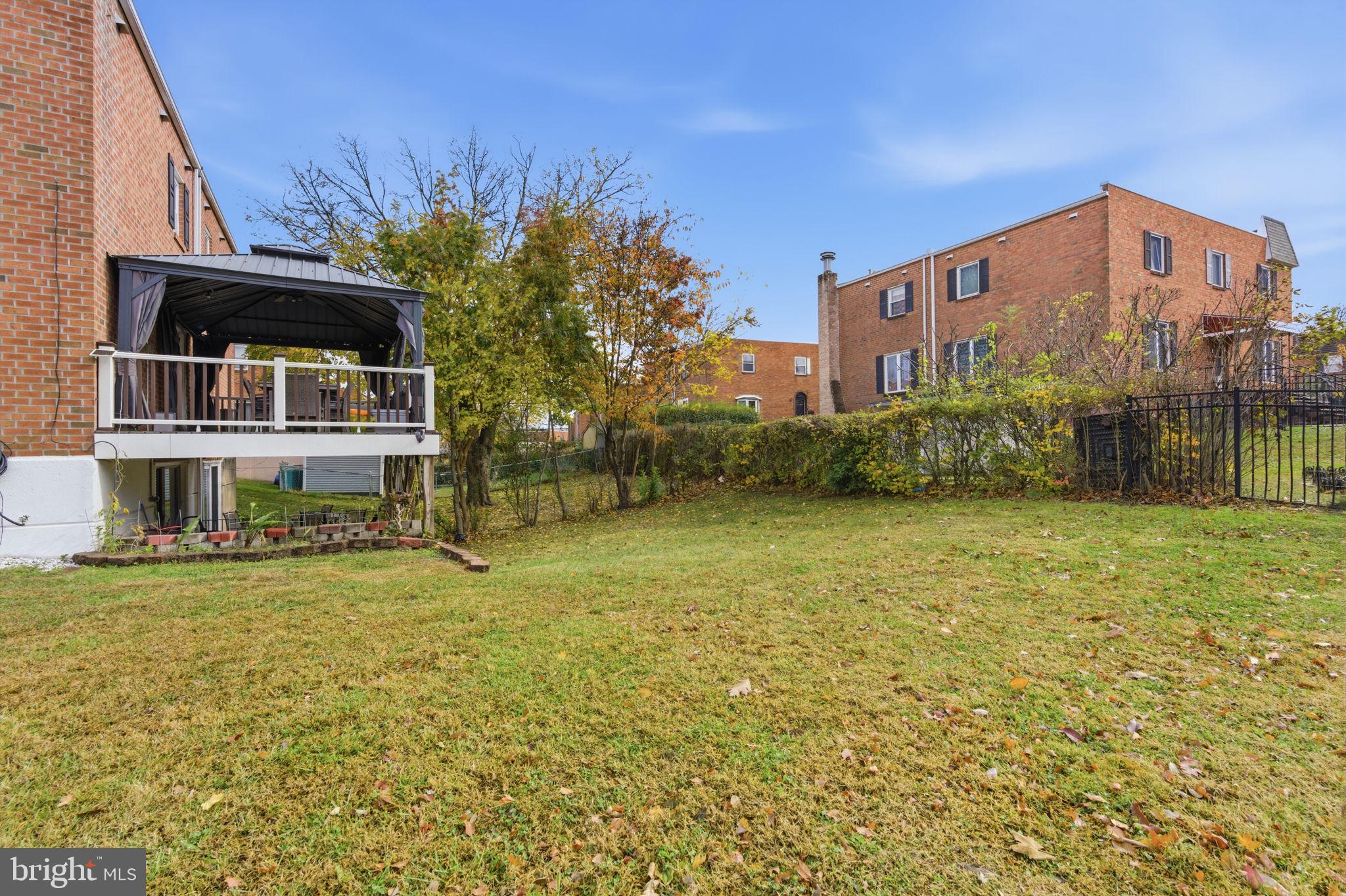 148 Rennard Street Philadelphia, PA 19116 - Photo 26 of 31 a backyard of a house with lots of green space