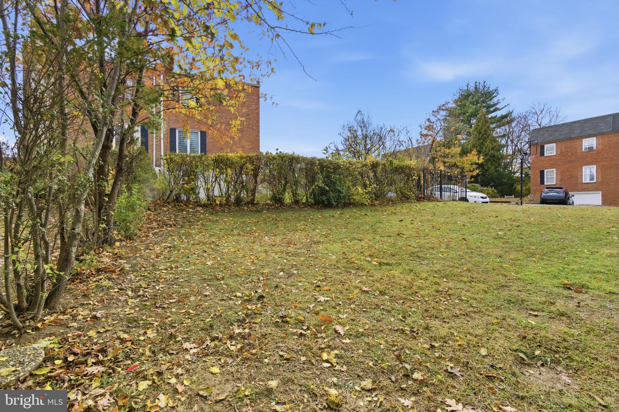 148 Rennard Street Philadelphia, PA 19116 - Photo 28 of 31 a view of a yard with a house in the background