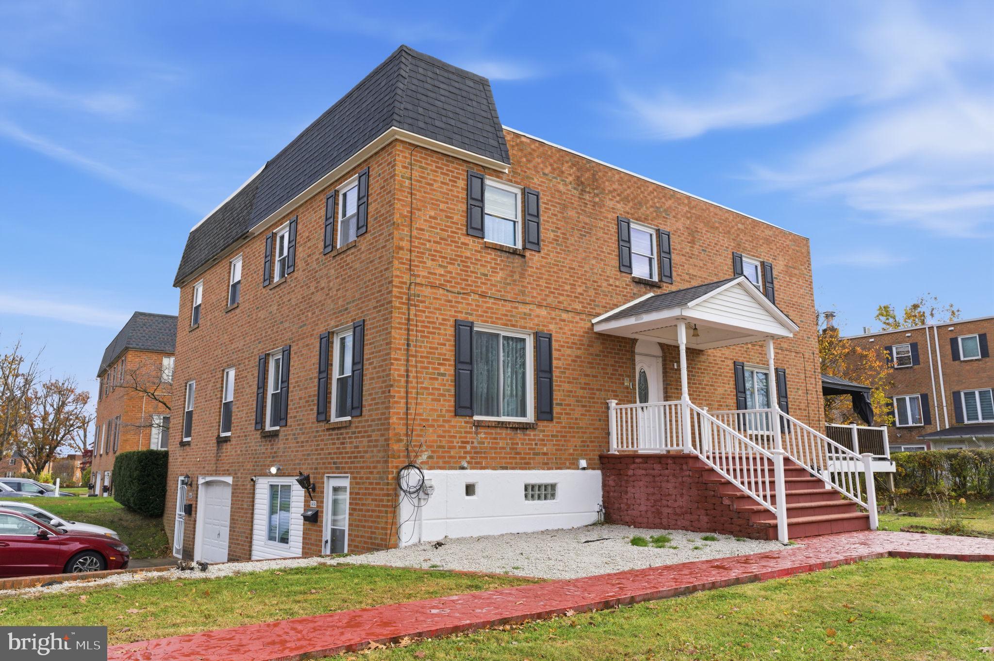 148 Rennard Street Philadelphia, PA 19116 - Photo 31 of 31 a front view of a house with a yard