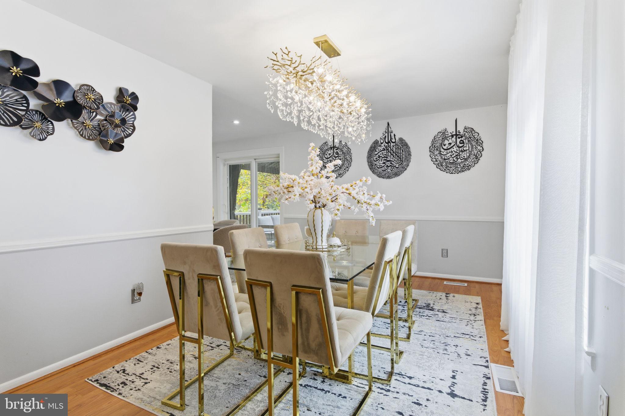 148 Rennard Street Philadelphia, PA 19116 - Photo 6 of 31 a view of a dining room that has a table and chairs in it