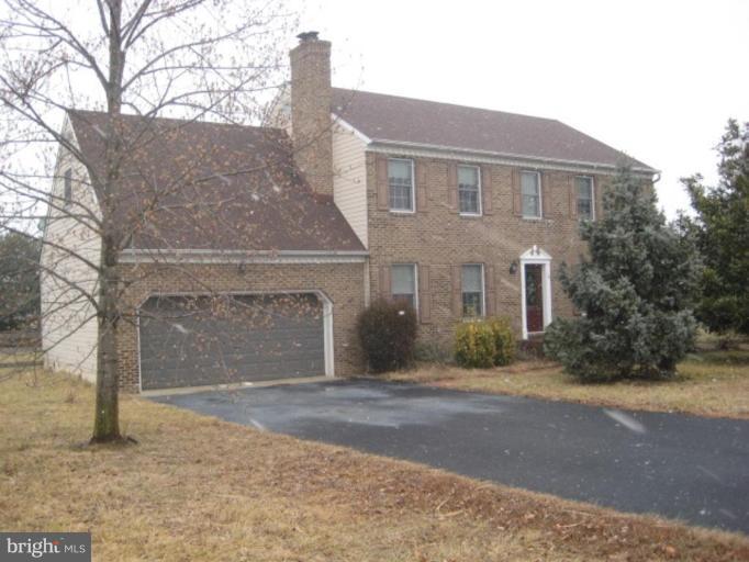 116 Sheaffer Road Chestertown, MD 21620 - Photo 1 of 21 a front view of a house with a yard and garage