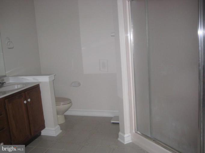 116 Sheaffer Road Chestertown, MD 21620 - Photo 11 of 21 a bathroom with a toilet a sink and vanity