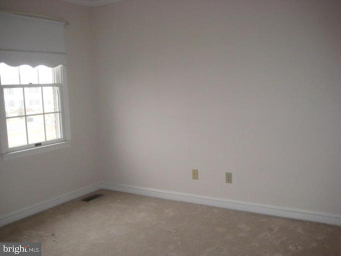 116 Sheaffer Road Chestertown, MD 21620 - Photo 14 of 21 an empty room with a window