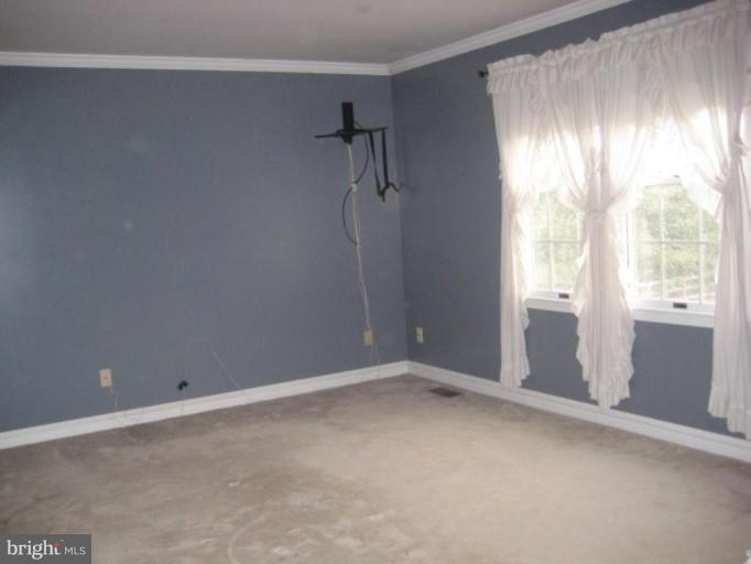 116 Sheaffer Road Chestertown, MD 21620 - Photo 9 of 21 a view of an empty room with a window