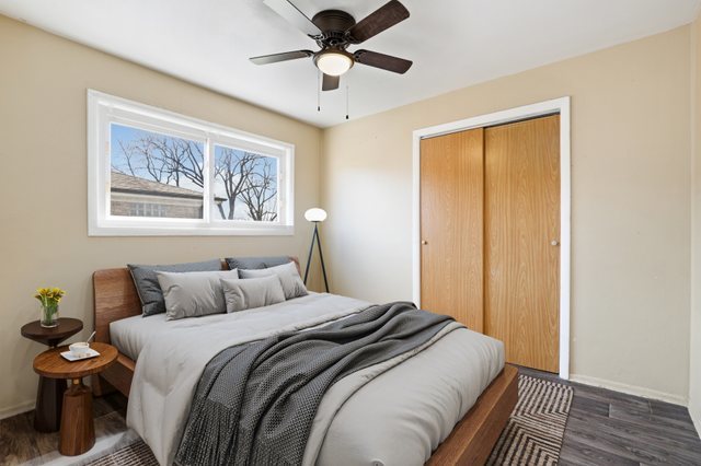14929 Cleveland Avenue Posen, IL 60469 - Photo 13 of 21 a bedroom with a bed and a painting on the wall