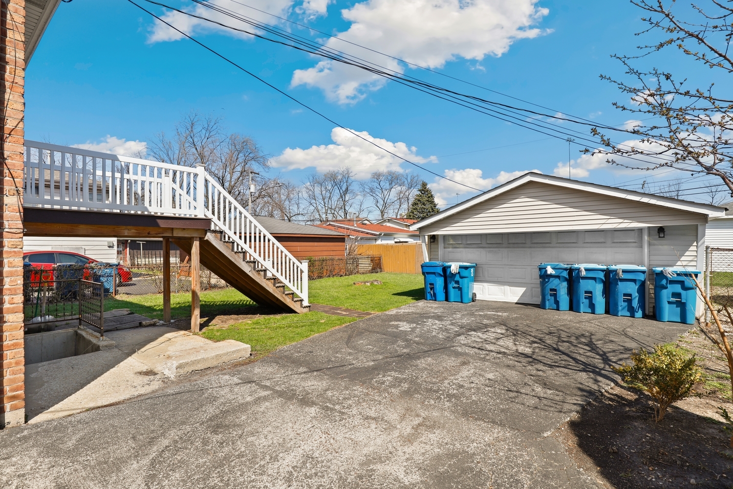 14929 Cleveland Avenue Posen, IL 60469 - Photo 17 of 21 a view of a house with a yard and potted plants