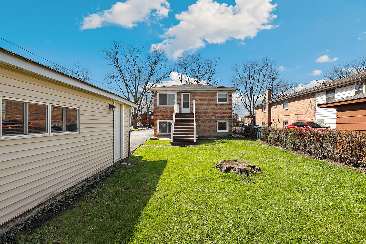 14929 Cleveland Avenue Posen, IL 60469 - Photo 18 of 21 a front view of a house with a yard