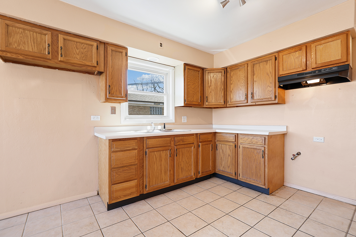 14929 Cleveland Avenue Posen, IL 60469 - Photo 10 of 21 a kitchen with granite countertop cabinets and sink