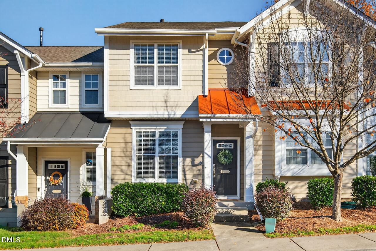 3811 Ramblewood Avenue Durham, NC 27713 - Photo 1 of 27 a front view of a house with garden